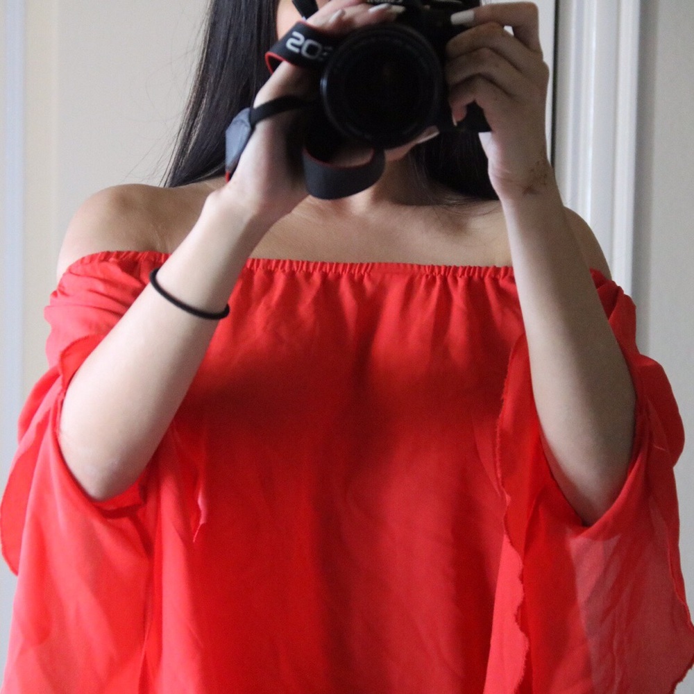 red off-the-shoulder blouse